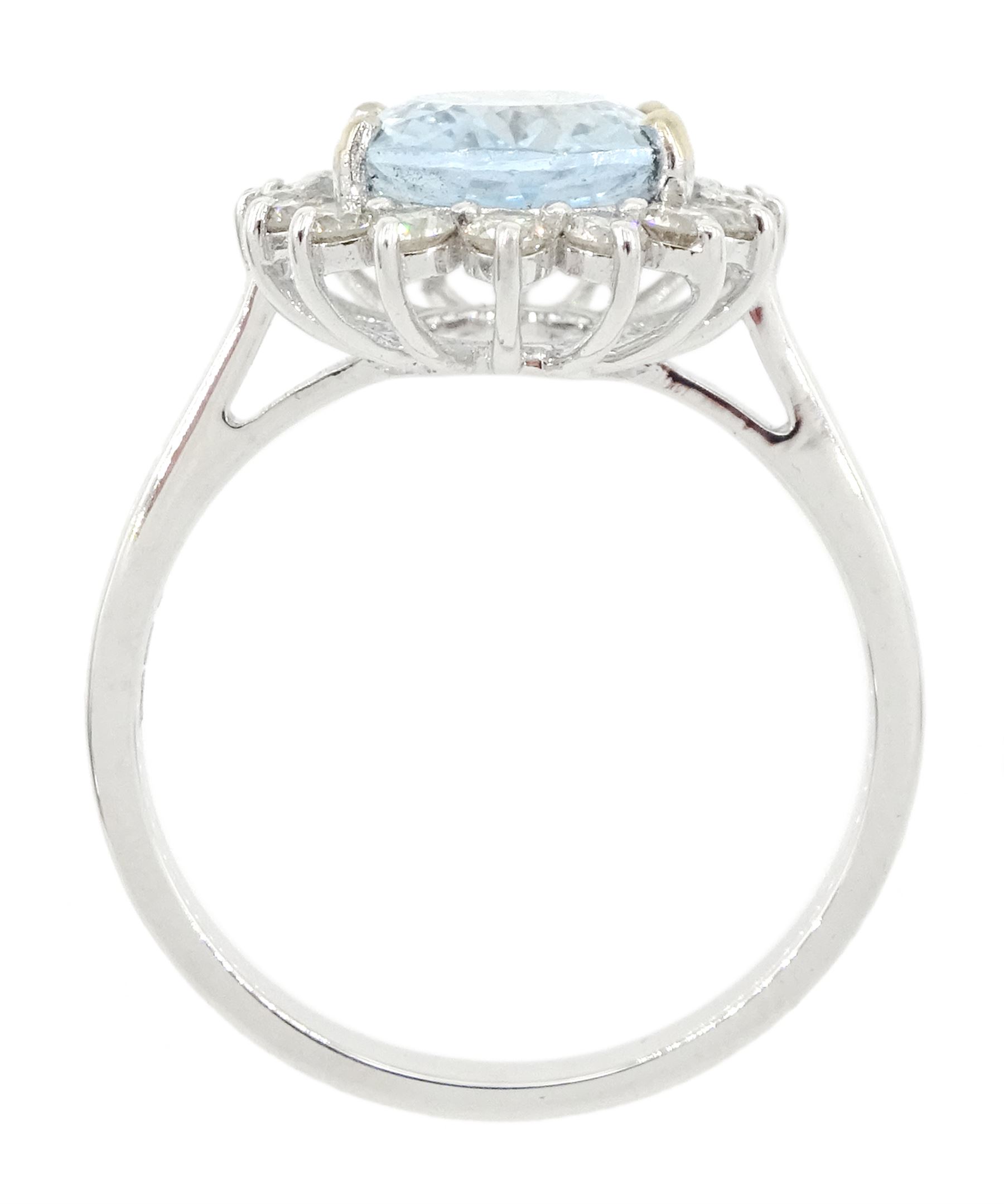 18ct white gold oval cut aquamarine and round brilliant cut diamond cluster ring, aquamarine approx 2.15 carat, total diamond weight approx 0.50 carat