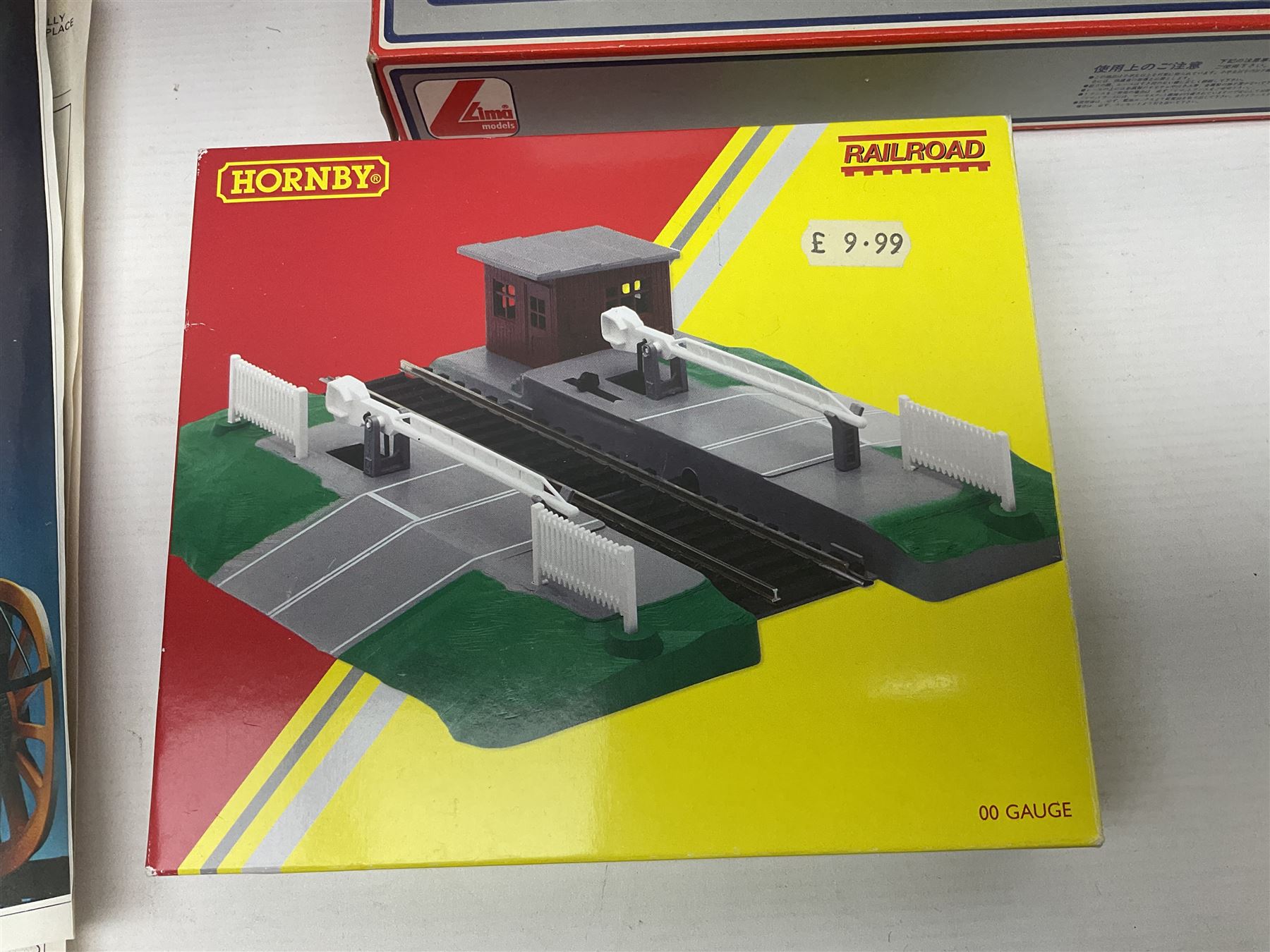 Hornby '00' gauge - Thomas the Tank Engine and Friends 0-6-0 tank locomotive No.1 with Annie and Clarabel coaches; all boxed; Breakdown Pack, Car Transporter Pack, Fuel Tanker Pack and Automatic Level Crossing; all boxed; Lima Car Transporter; boxed; and quantity of trackside accessories etc