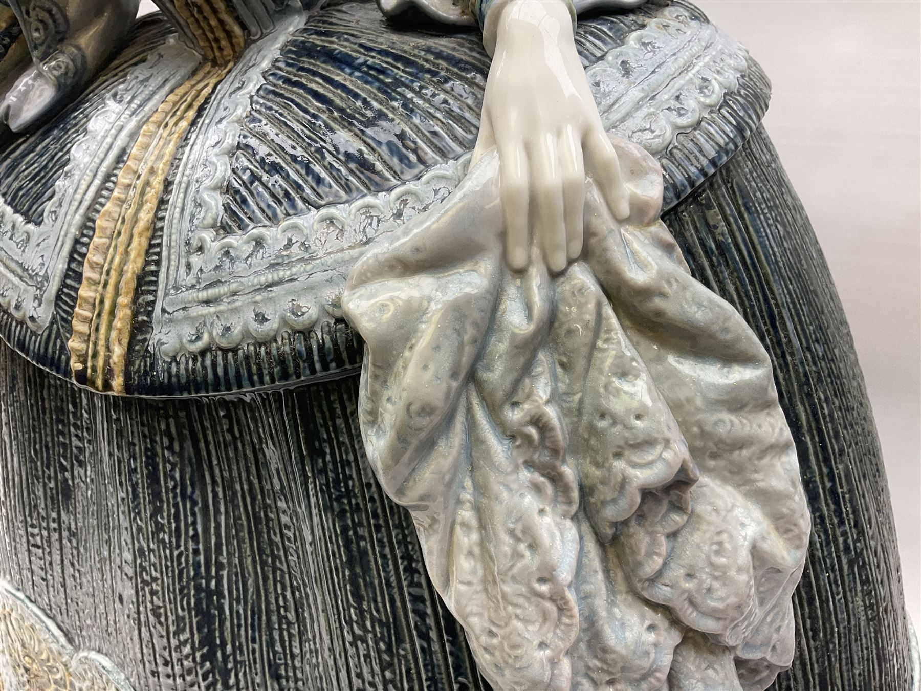 Large Lladro figure, La Menina, modelled as a maid of honor in service, on a mahogany oval base, limited edition 99/1000, sculpted by Jose Puche, with certificate of authenticity, framed and glazed, no 1812, year issued 1996, year retired 2019, H60cm