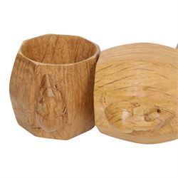 Mouseman - four light oak napkin rings, of bulbous octagonal form with signature mouse carving by Robert Thompson of Kilburn