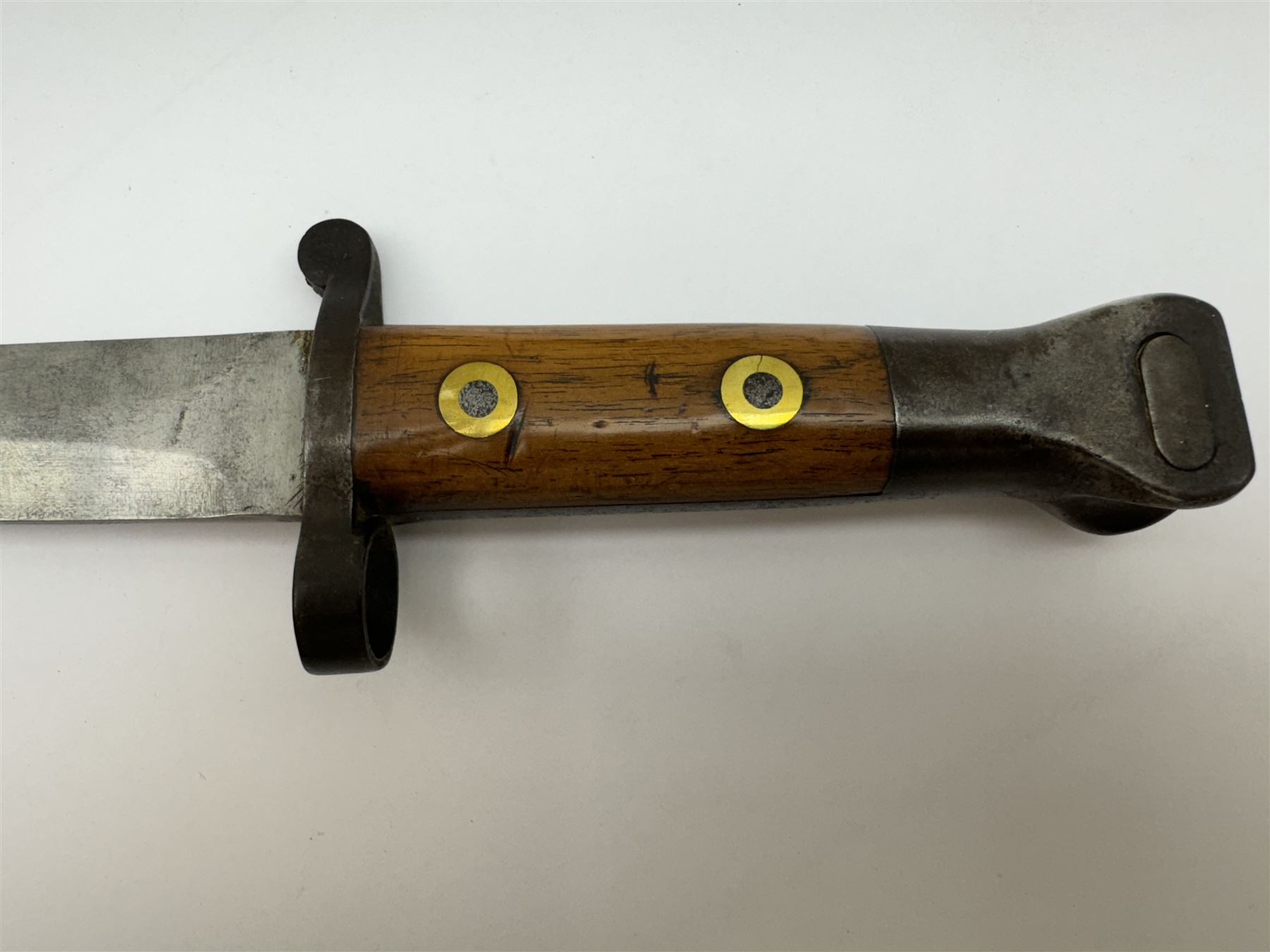 WWII Lee Metford rifle bayonet with original scabbard marked 586, with canvas frog, L44cm overall 
Notes; due to the condition of the bayonet it is possible this was issued to the home guard