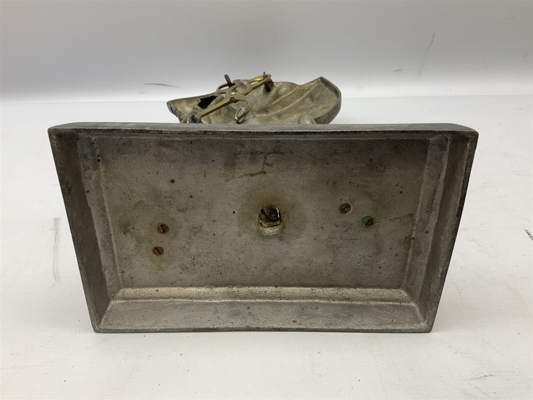 Cast iron fire companion set modelled as a knight in armour with fleur-de-lis shield and sword concealing fire poker, with brass tongs to reverse, raised upon stepped rectangular base, H55cm