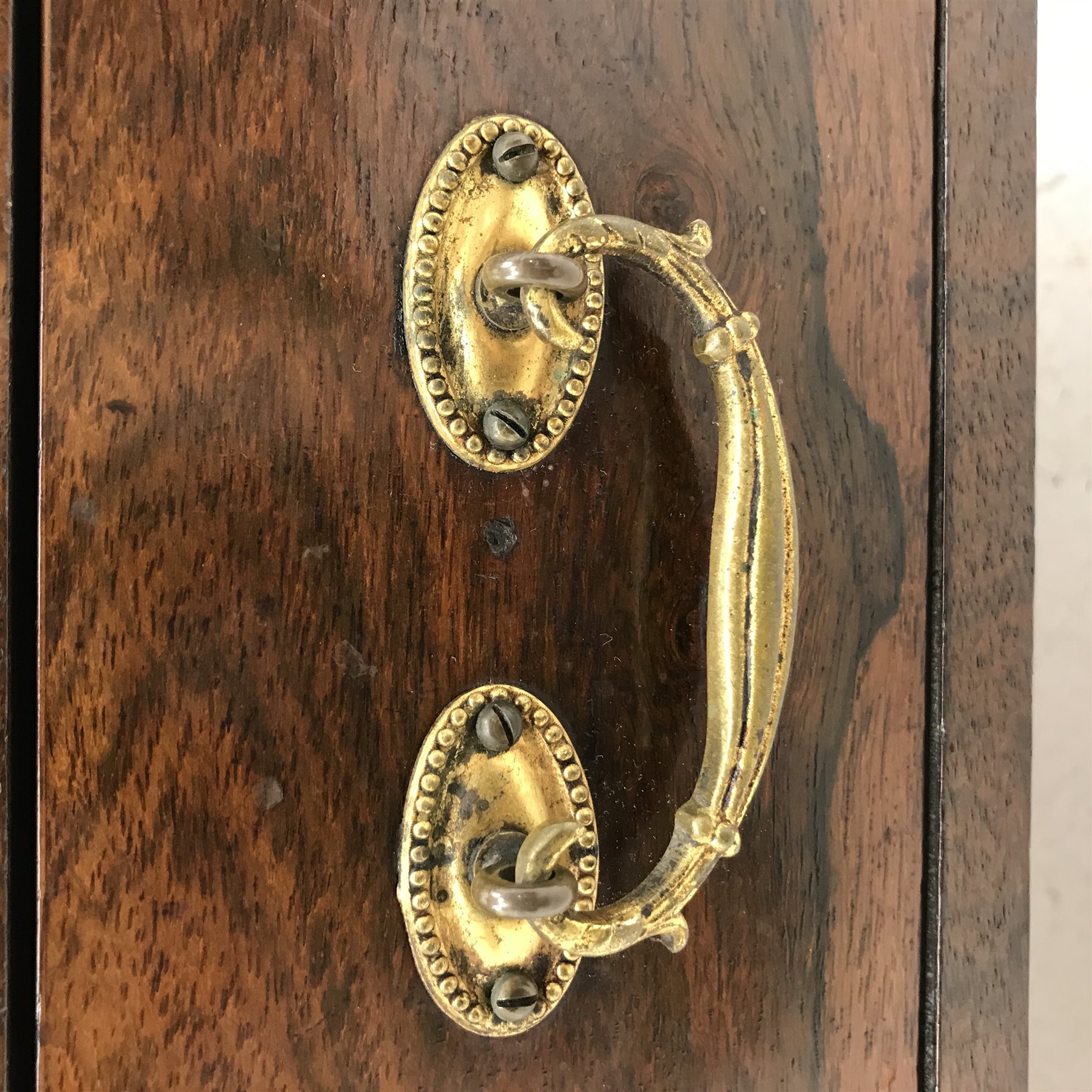 Victorian rosewood two tier etagere, scroll fretwork gallery back, carved elongated c scroll supports with scrolled terminals and barley twist supports, single drawer to base, turned and lobe carved feet with brass cups and castors, W77cm, H94cm, D36cm