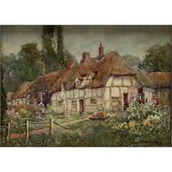James W Milliken (British 1887-1930): Thatched Cottages, watercolour signed 14cm x 19cm