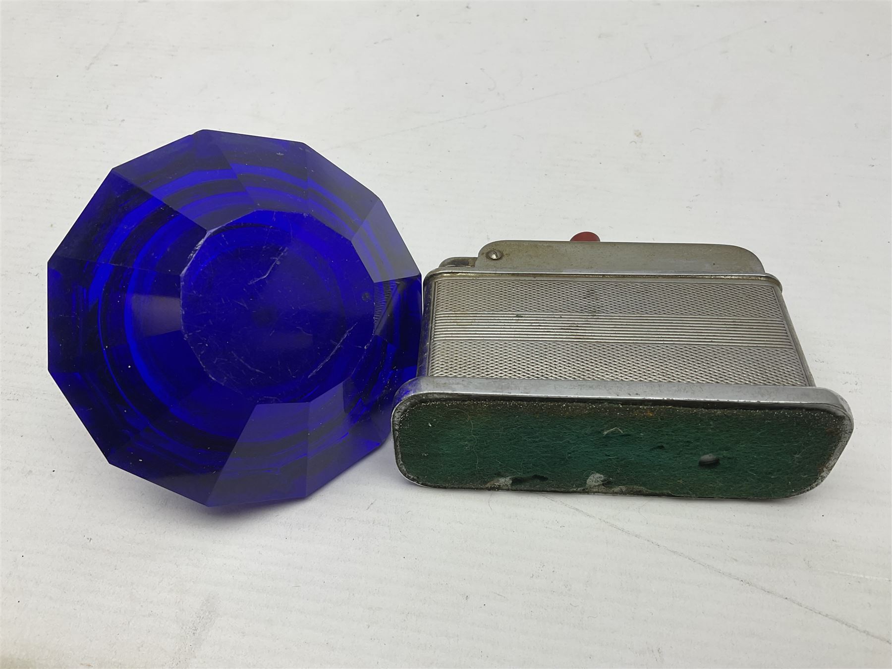 Collection of lighters, including Ronson Varaflame, Zorr Classic, Dunhill bark effect roller gas lighter, and faceted blue glass table lighter, etc