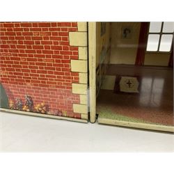 Mid-20th century Mettoy tin-plate double-fronted two-storey doll's house, the front elevation with five unglazed windows flanked by green shutters, central opening door, open back giving access to five rooms together with an attached garage, 60cm wide