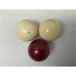Burroughes & Watts mahogany backed billiards scoring paddle, with nickel counters impressed 'Spot' 'Plain' 'Rivoire' and 'Brevete', H32cm W26.5cm, together with another oak backed example, and three ivory billiards balls in original box, (3)