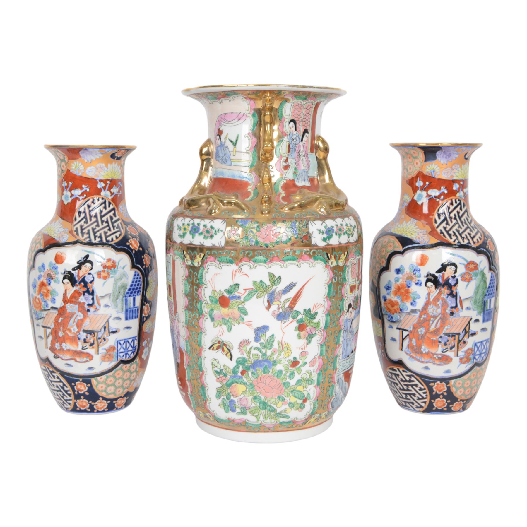 Pair of Japaneses imari vases, the central panel, decorated with figures in a landscape, together with famille rose vase, largest H37cm  
