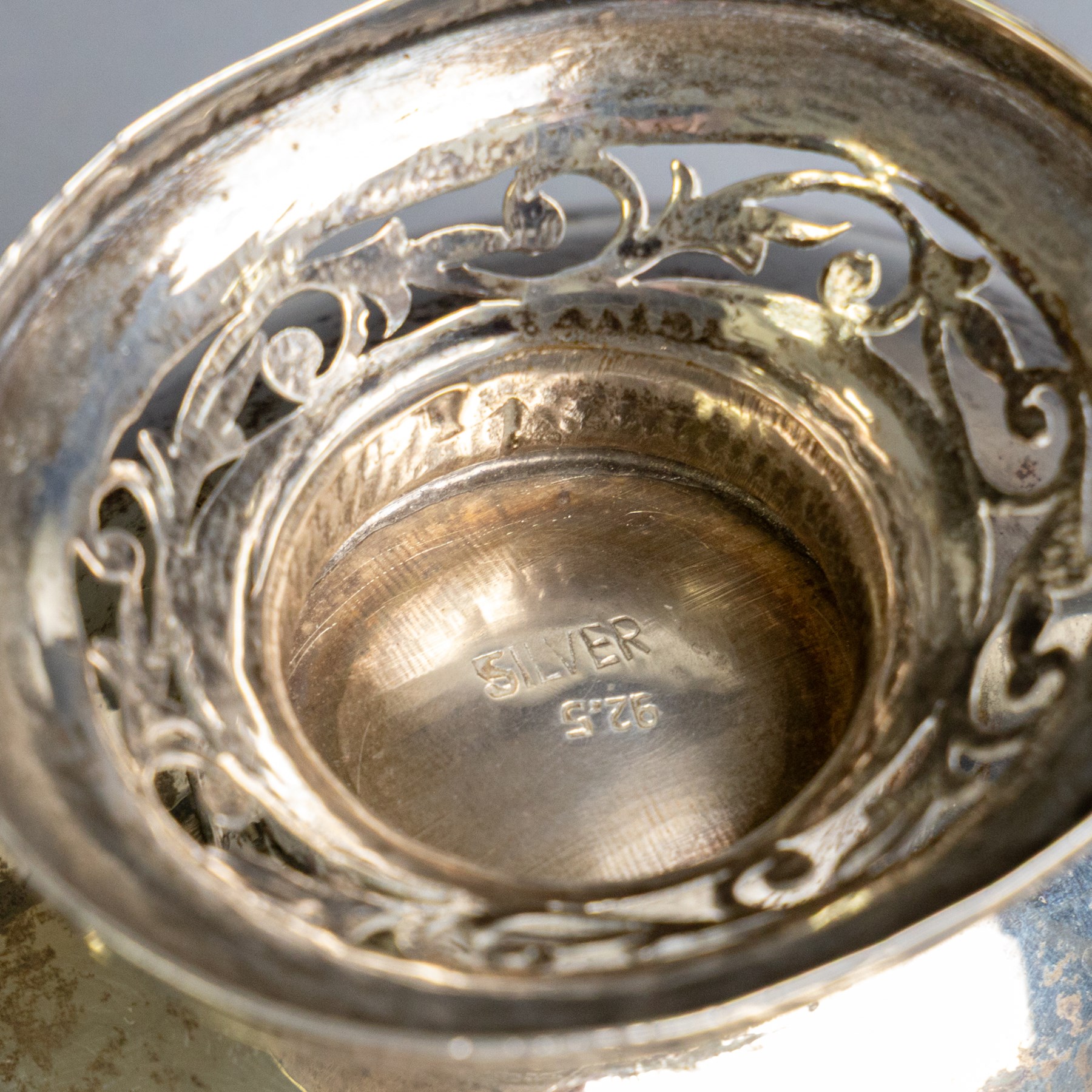 Indian silver bon bon dish, of oval form with pierced foliate decoration to sides and foot, H7cm, W12.5cm
