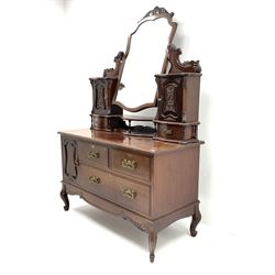Unusual late Victorian mahogany dressing table, raised shaped bevelled mirror back, two carved trinket cupboards above four short and one long drawers, cabriole feet  