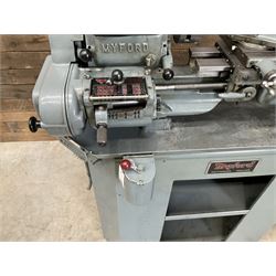Myford Super 7 metal turning lathe with extensive collection of attachments, chucks, collets, bits; and precision metal saw