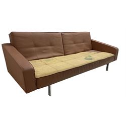 Mid-20th century large three-seat sofa bed, hinged and folding back cushions, upholstered in leather, on chromed metal base