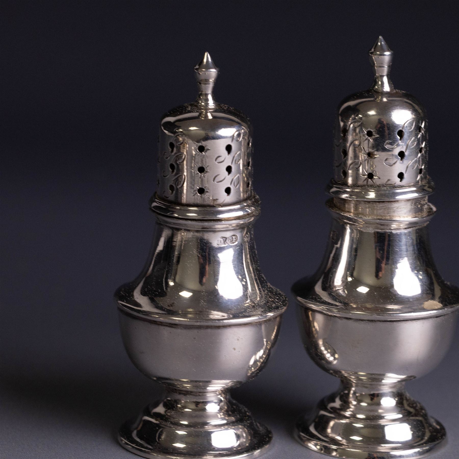 Silver cruets, including pair of open salts, mustard pot and cover, two silver pepper shakers and a collection of spoons, all hallmarked