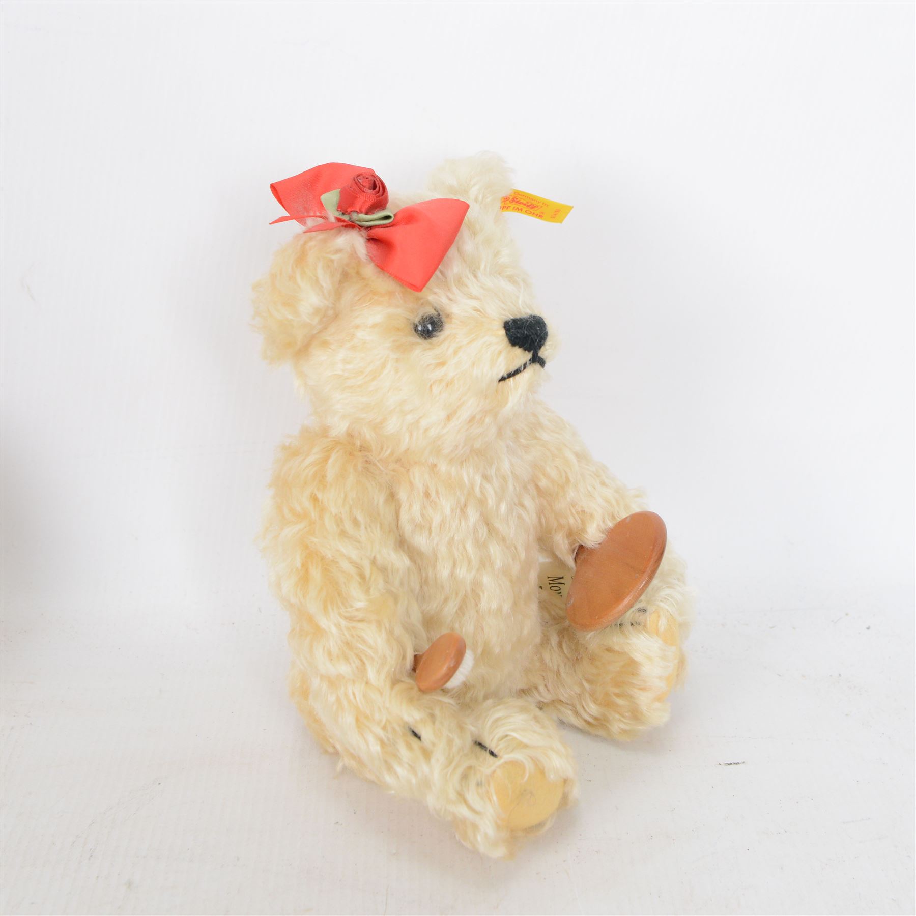 Set of seven Steiff Days of the Week Bears, issued by Danbury Mint, seven jointed bears with stitched noses, all dressed for a different day of the week, with Steiff button in ear and original tags, H24cm