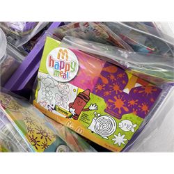 Large quantity of Mcdonalds toys to include Herbie and Polly Pocket in three boxes