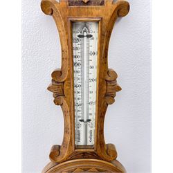 Early 20th century carved oak card aneroid barometer with visible aneroid and mercury thermometer, by ‘C. J. Gowland, Sunderland’ 