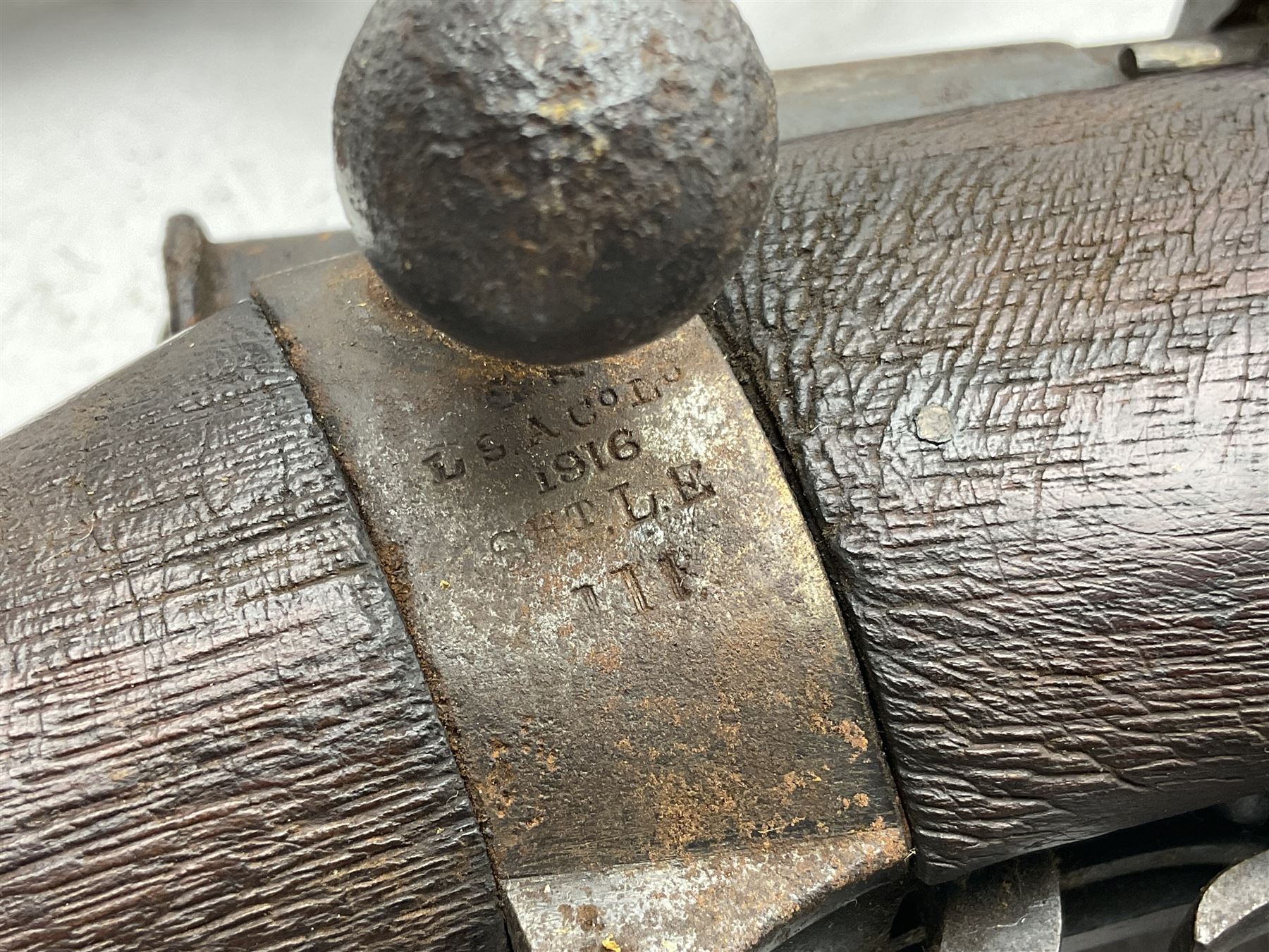 WW1 Lee Enfield SMLE .303 bolt action rifle with 63.5cm barrel and magazine; No.20934; L112cm overall; home deactivated by welding down bolt and end of barrel so requires re-deactivation to modern standards; and 19th century 12-bore double barrel hammer shotgun with 65cm cut-down barrels, non-rebounding hammers and under-lever opening, the lock-plate indistinctly inscribed G.T. Bartrant(?) L75cm overall; home deactivated by welding both barrels closed at breech so requires re-deactivation to modern standards (2) RFD ONLY 