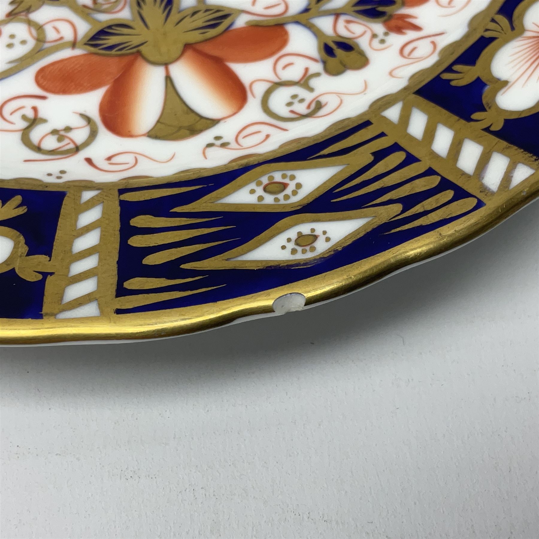 Ten Royal Crown Derby plates all in imari pattern 2451, in various sizes, comprising five D15.5cm, four D18cm and one D23cm