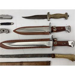 Two bayonets AK-47 CCCPs in leather cases, together with a selection of hunting knives, pen knives and a double bladed axe
