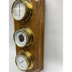 Mouseman - oak wall hanging combination weather centre, with independent barometer, hygrometer and thermometer dials, on canted rectangular board with stepped moulded edge carved with mouse signature, by the workshop of Robert Thompson, Kilburn 