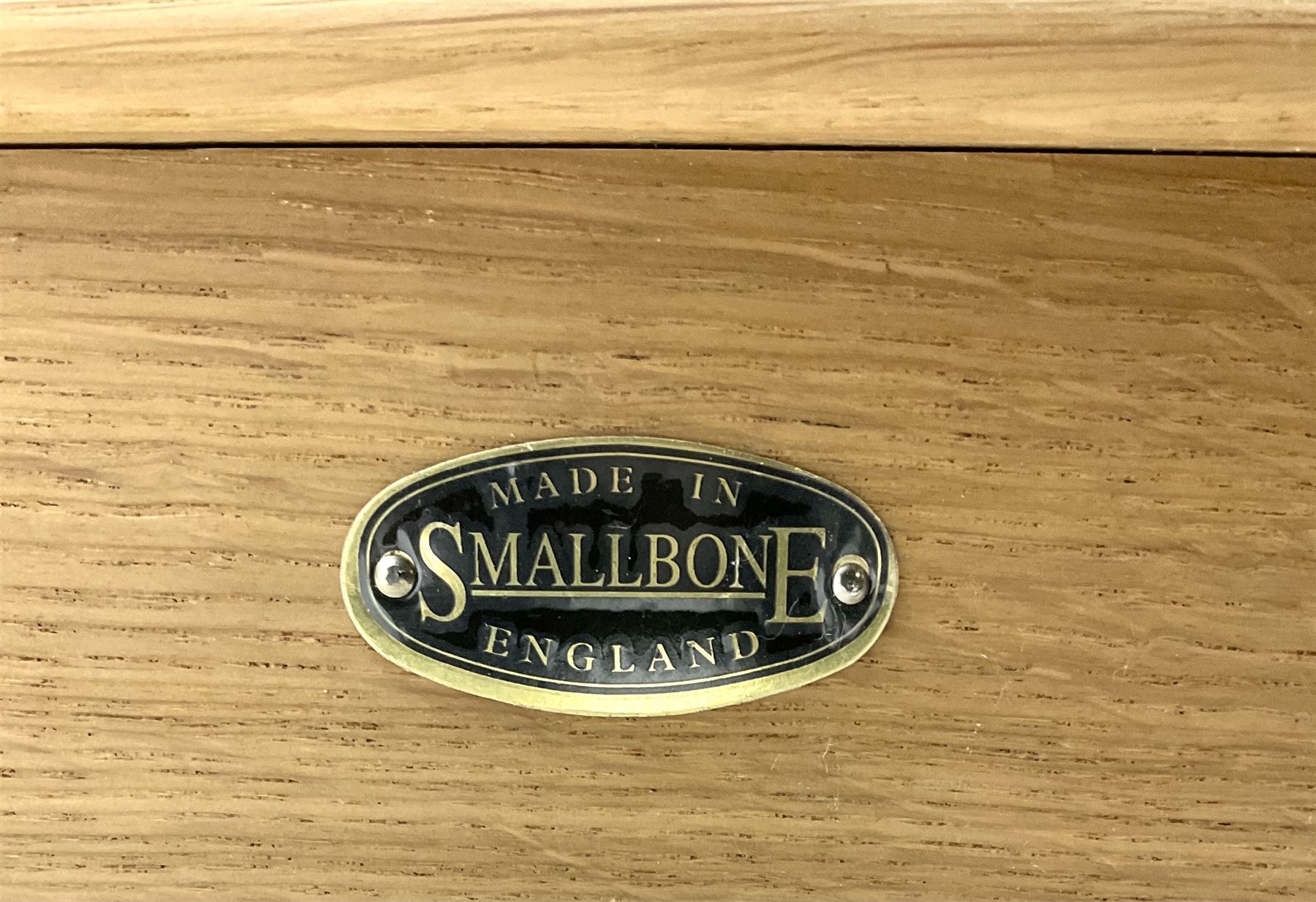 Smallbone light oak bookcase, projecting cornice above two chequered opaque glazed doors enclosing three adjustable shelves