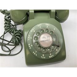 Four telephones with rotary dials, to include an examples marked P.O21057, 1159 and a blue example marked 706 L PX 63/2 with junction box marked G.P.O