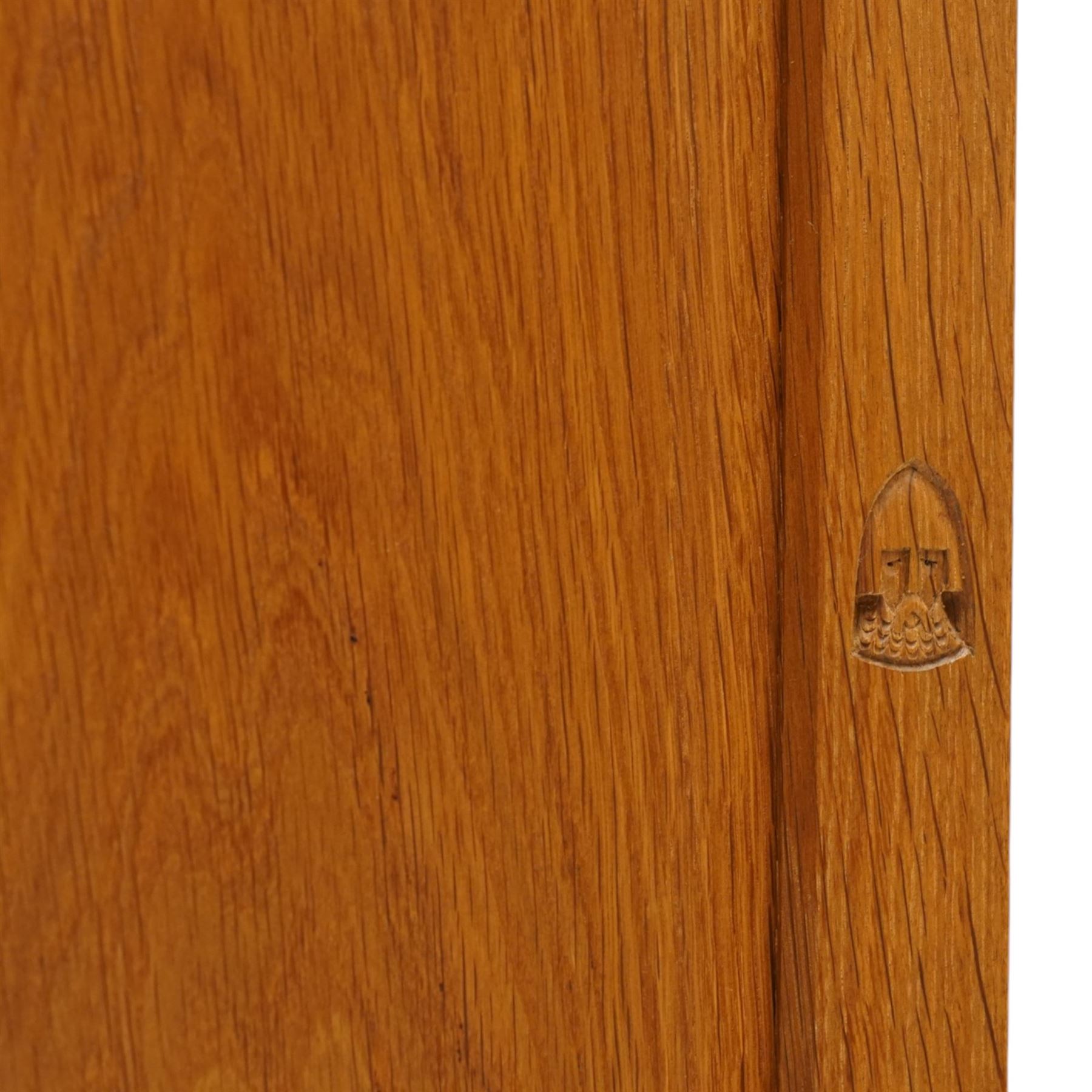 Knightman - Yorkshire oak dresser, the upper section fitted with two drawers flanked by two hutch cupboards, rectangular top over three drawers and fielded panelled cupboard, on skirted base, carved with knight signature, by Horcace Knight of Thirsk