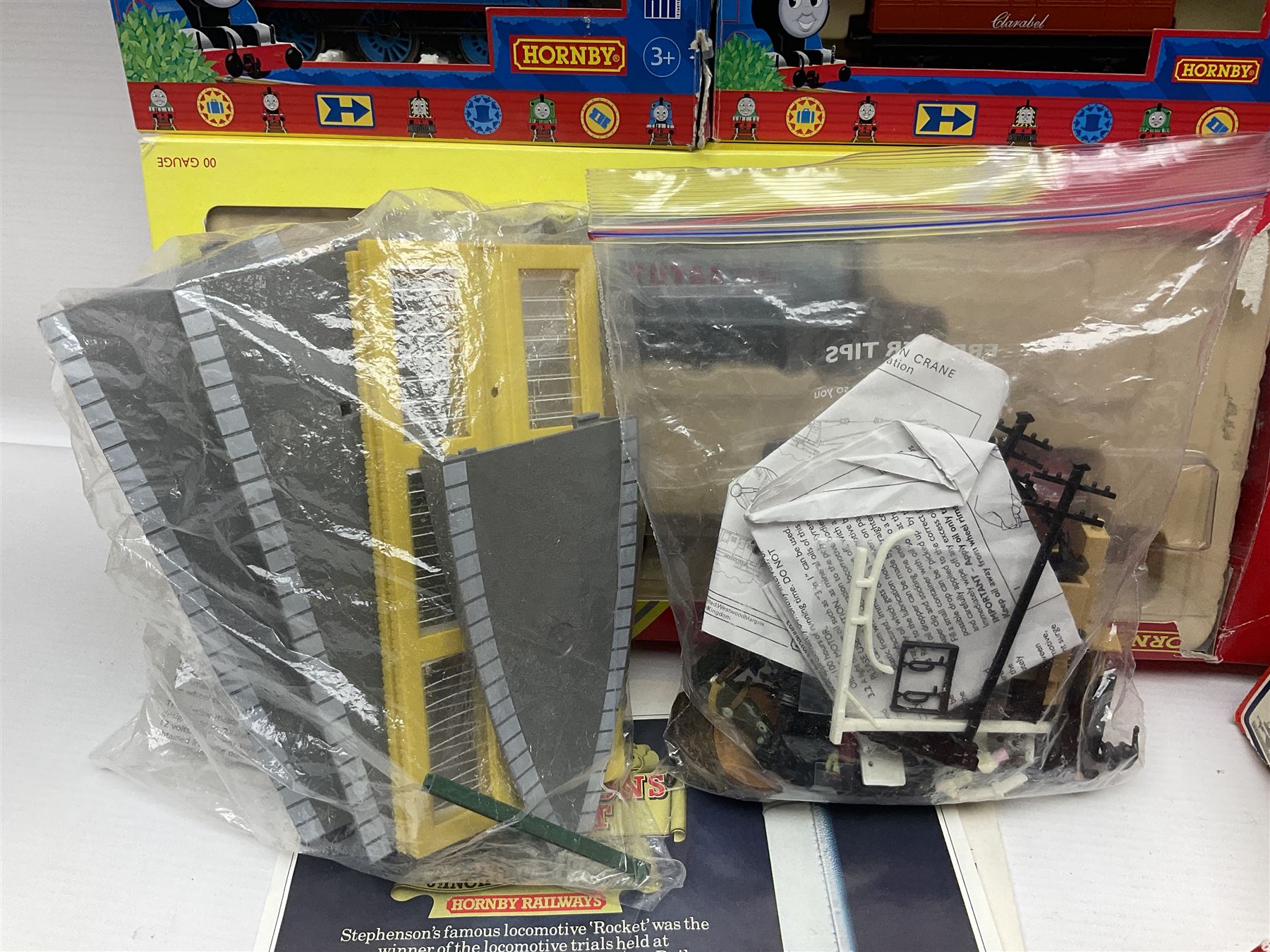 Hornby '00' gauge - Thomas the Tank Engine and Friends 0-6-0 tank locomotive No.1 with Annie and Clarabel coaches; all boxed; Breakdown Pack, Car Transporter Pack, Fuel Tanker Pack and Automatic Level Crossing; all boxed; Lima Car Transporter; boxed; and quantity of trackside accessories etc