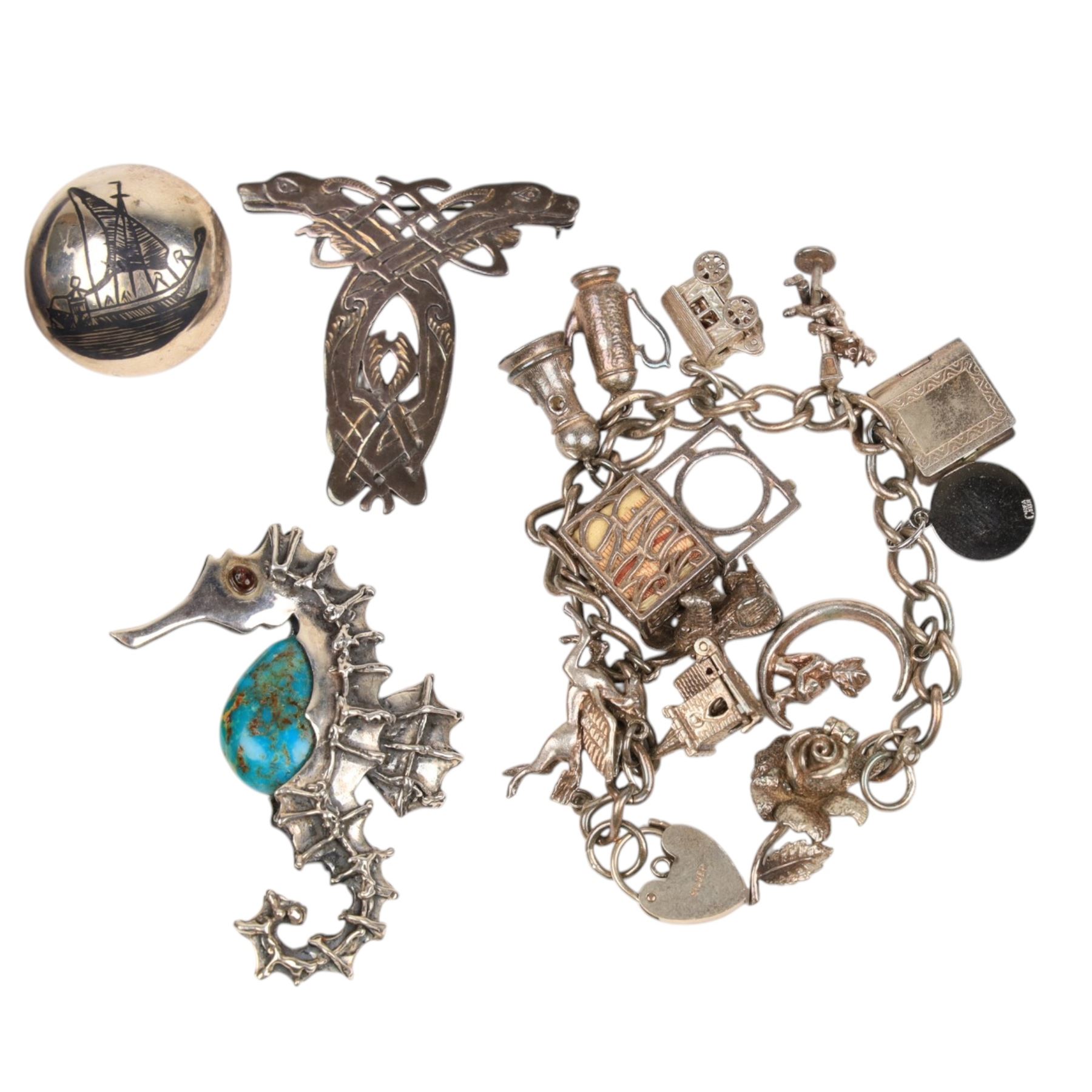9ct gold stone set ring, hallmarked, 9ct and silver ring, silver charm bracelet, silver brooches and silver-gilt fob, all stamped or hallmarked