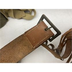 Mundial Brazil bowie knife, the 15.5cm steel blade inscribed 'Sheriff Knife', with banded and aluminium hilt; in leather sheath L29cm overall; British Army felt covered metal water bottle with webbing strap; leather 12-bore cartridge belt; and small pair of non-military binoculars in part case (4)