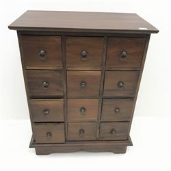 Stained hardwood haberdashery style chest, twelve drawers, shaped platform base, W70cm, H92cm, D42cm