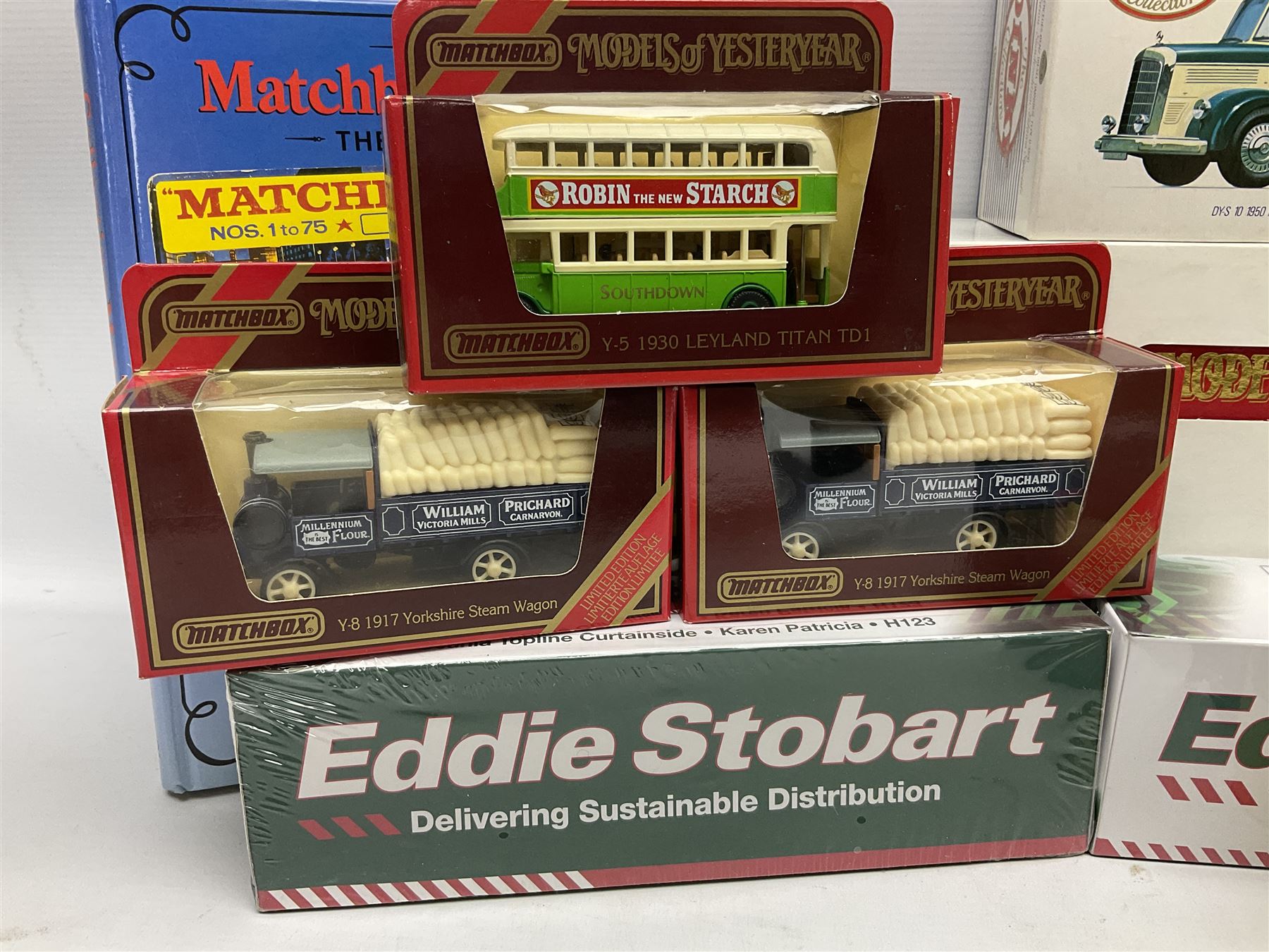 Matchbox - 1929 Scammell 100 ton truck with GER 2-4-0 locomotive; 1936 Leyland Cub Fire-Engine; five Models of Yesteryear; six Dinky Collection vehicles; and Matchbox reference book; together with three Atlas Eddie Stobart vehicles; and three Lledo promotional models; all boxed 