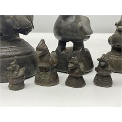 19th century graduating set of Burmese bronze opium weights, in the form of Hintha birds, tallest H11.5cm (8)