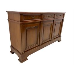 Contemporary cherry wood sideboard, rectangular moulded top over three drawers and three cupboards