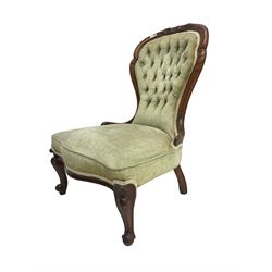 Victorian walnut framed nursing chair, upholstered in buttoned laurel green fabric with sprung seat, raised on cabriole supports