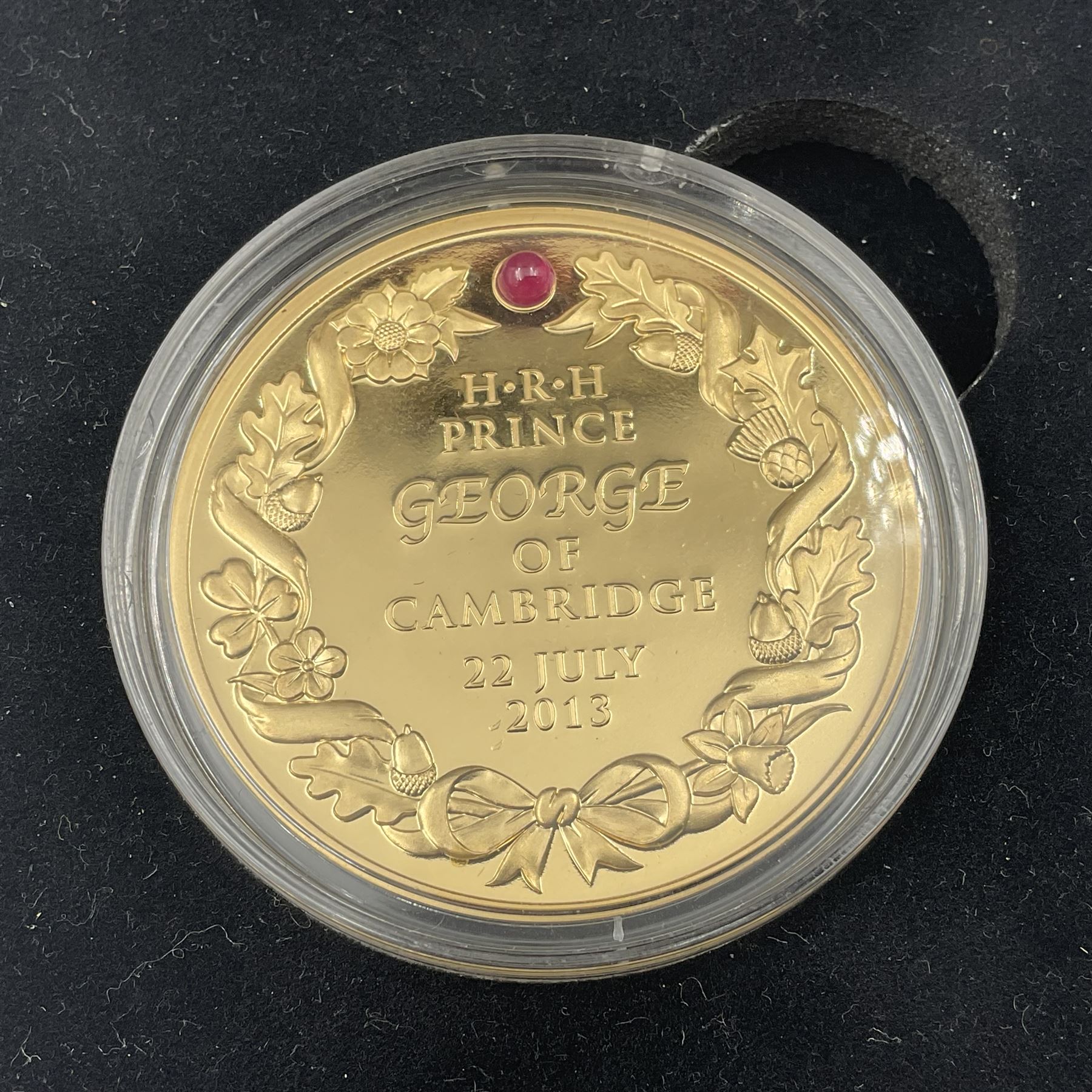 'HRH Prince George of Cambridge The Royal Baby' gold commemorative medallion, weighing 34 grams of 22 carat gold, cased with certificate