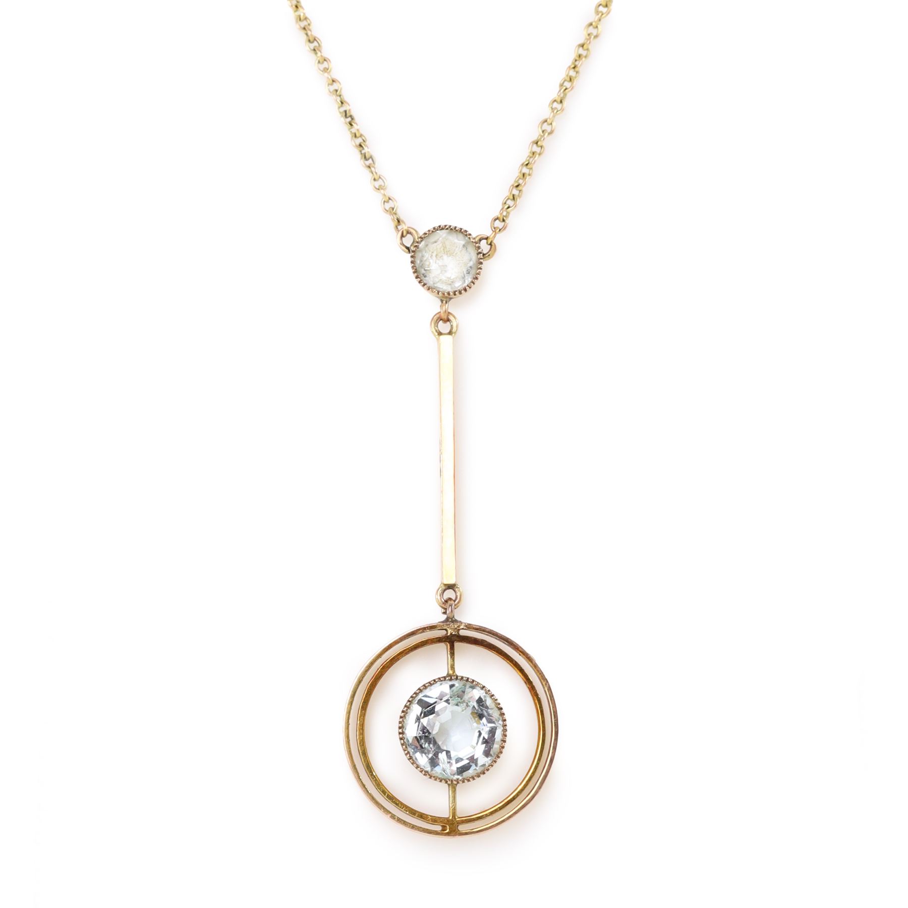 Early 20th century gold aquamarine pendant necklace, milgrain set round cut aquamarine within a pierced circular setting, to a smaller round cut aquamarine, on a fine trace link chain necklace, stamped 9ct, in a velvet and silk lined box by Leefe & Sons, Malton