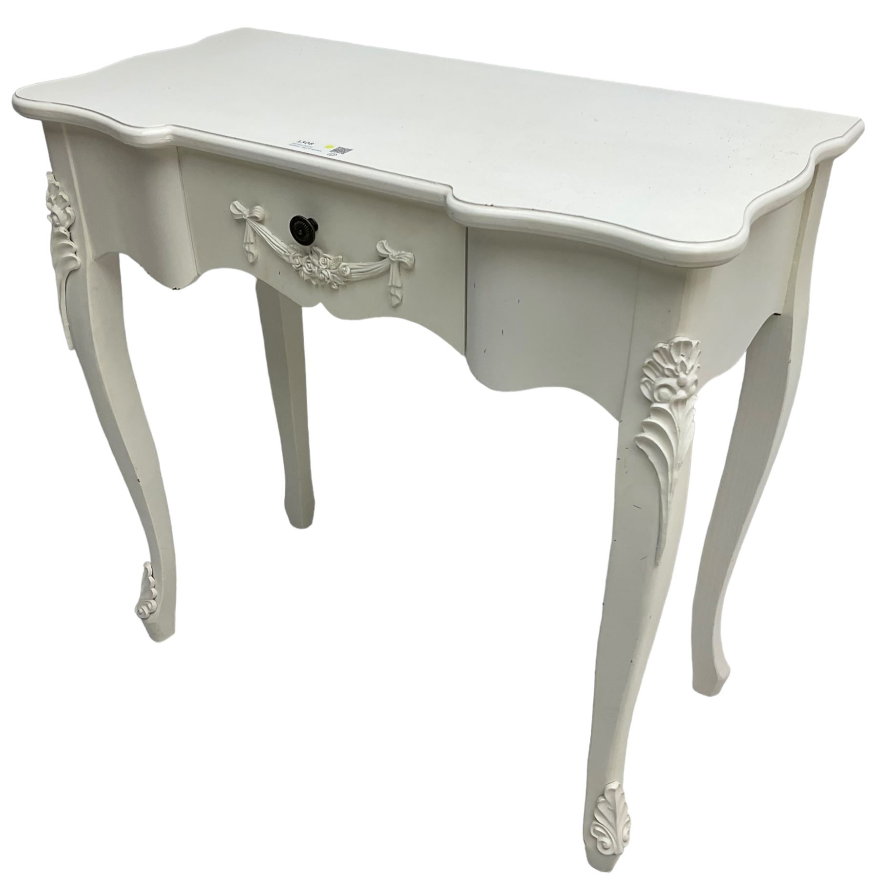 French design white painted console table, shaped top, fitted with single drawer with applied swag decoration, raised on cabriole supports decorated with foliate mouldings