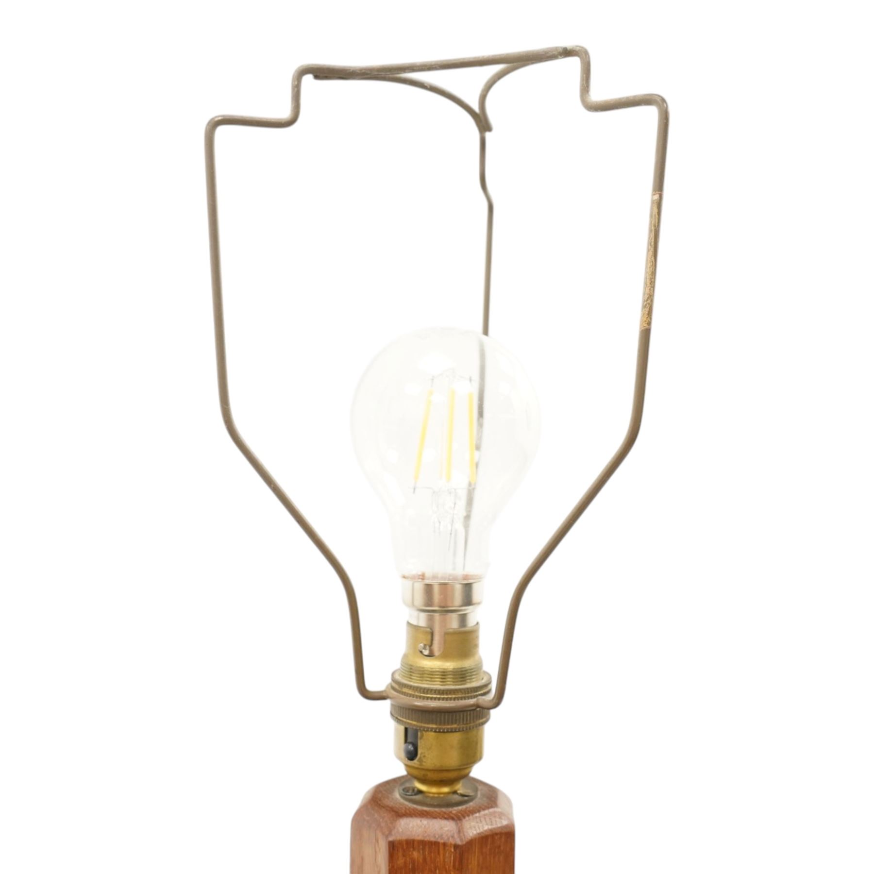 Mouseman - mid-20th century oak standard lamp, octagonal turned column, with faceted stepped base, with carved mouse signature, by the workshop of Robert Thompson of Kilburn