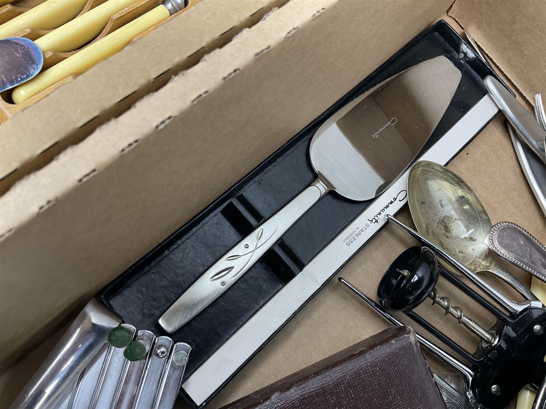 Set of four hallmarked silver teaspoons modelled on spoons from the Roman Imperial period, silver fork, and quantity of silver plated and other cutlery to include Walker & Hall, in two boxes