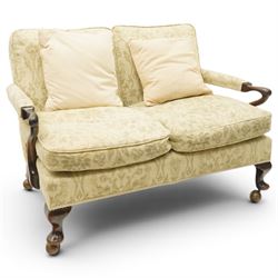 George II design mahogany framed three-piece salon suite, comprising settee and two armchairs, with pale green floral patterned upholstery, scroll carved arm terminals, loose cushioned seats and backs, raised on cabriole supports terminating in castors
Armchairs (H 80cm, W 62cm, D 73cm)