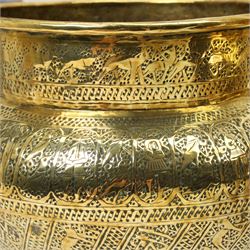  Islamic brass jardiniere  with all over engraving of figures, animals etc D31cm and a slightly smaller matching jardiliere D27cm 