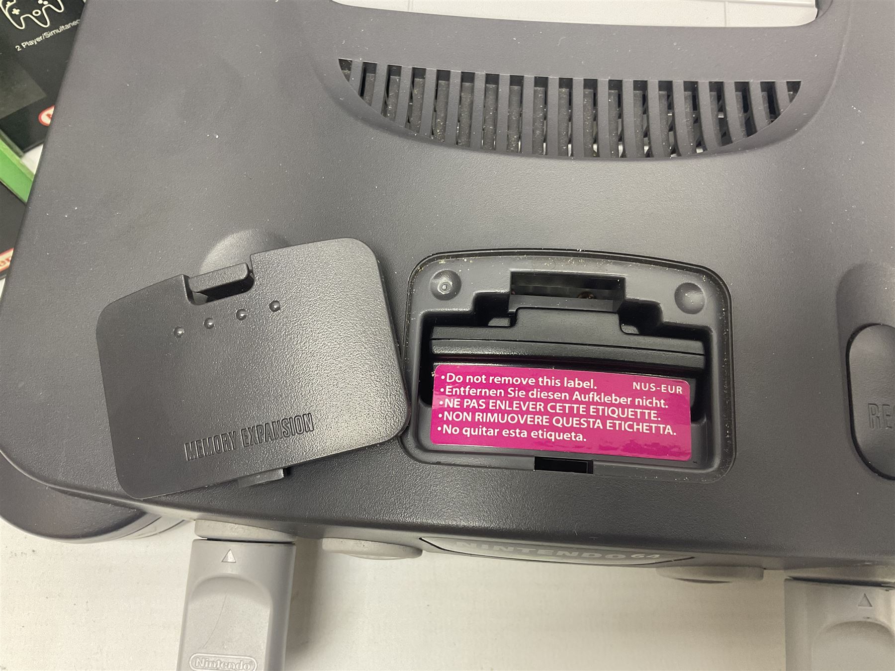 Nintendo 64 console, two controllers, games and accessories. Accessories to include the ‘Tremorpak’ and ‘Spook’ 2 Phono plugs and a S-VHS plug with adapter, both in original boxes. Games to include ‘Golden Eye 007’, ‘Doom 64’, ‘Killer Instinct Gold’, ‘Tetrisphere’, ‘F-1 World Grand Prix’, ‘Pilotwings 64’ and ‘Lylatwars’ with ‘Rumble Pak’, all with original boxes and instruction manuals. ‘Star Wars Episode I Racer’ game cartridge in Shadows of the Empire box. 