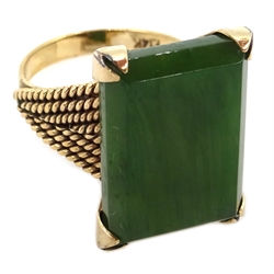  Gold emerald cut jade ring, stamped F.14K  