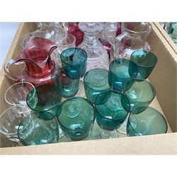 Millefiori paperweight, together with Caithness paperweight, Isle of Wight vase, cranberry glass tumblers, claret jug, decanters and other glassware, in three boxes 