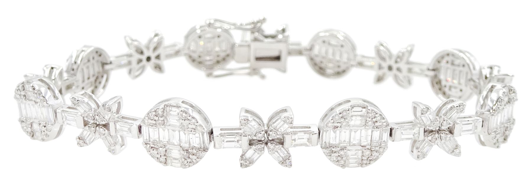 18ct white gold diamond bracelet, eight circular, pave set round brilliant cut and baguette cut diamond clusters, spaced by a single baguette cut diamond and a diamond flower head design cluster, stamped 750, total diamond weight approx 3.70 carat