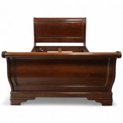 Late 20th-century mahogany Empire-style double sleigh bed, scrolled panelled headboard, and footboard, base with moulded plinth raised on bracket feet