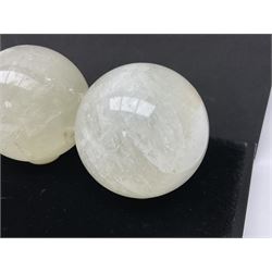 Set of three clear calcite spheres, D8cm