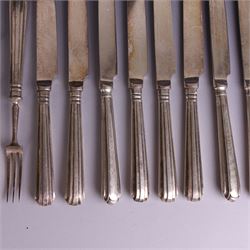 Set of twelve 1920s silver handled dessert knives and forks, hallmarked Thomas Bradbury & Sons Ltd, Sheffield 1921