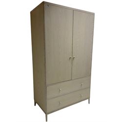 Ercol - 'Salina' wardrobe enclosed by two doors, fitted with two long drawers
